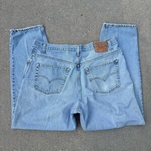 VTG Y2K Levi's 560 Loose Fit Tapered Leg Light Blue Jeans 42x32 worn in faded